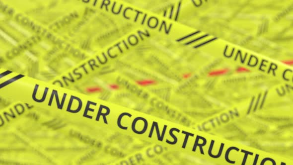 Yellow and Red Tapes with UNDER CONSTRUCTION Text
