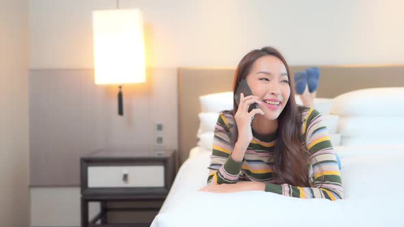 Young asian woman use smart phone