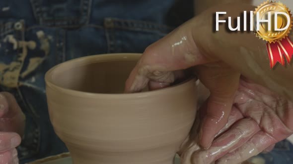 Potter Craftsman is Teaching a Student Working 