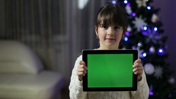 Girl Hold a Tablet Pc With Green Screen