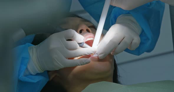 Woman undergo dental check up in clinic