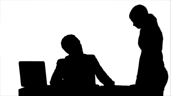 Silhouette Angry Boss With Female Worker In Office