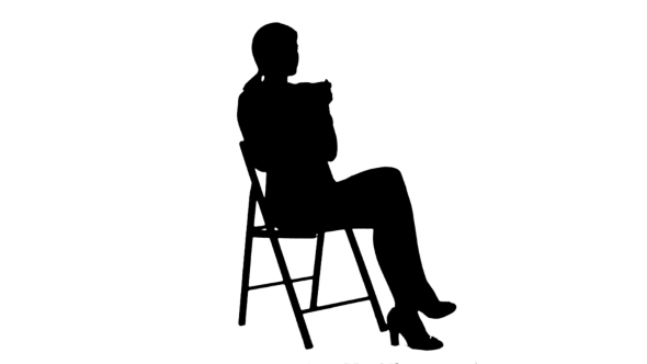Silhouette A Young Attractive Woman With a Cup Of