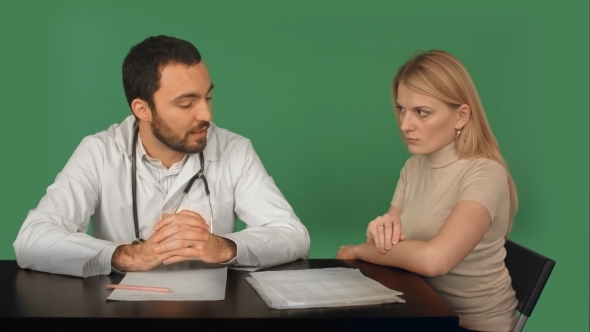 Male Doctor Asks The Patient To Pay On a Green
