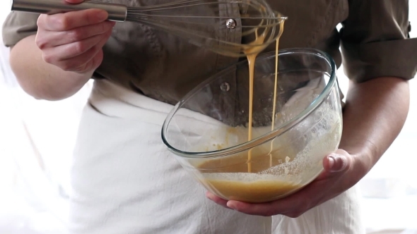 Woman Mixes Ingredients For Sponge Cake. Rustic