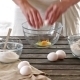 Woman Breaking Eggs Into a Bowl. Rustic Style. - VideoHive Item for Sale