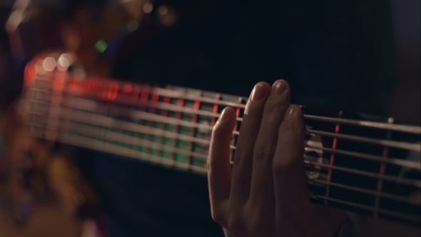 Man Plays Electric Guitar With His Special alt
