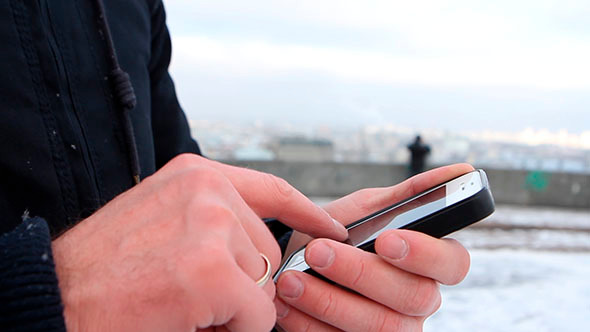 A Man Uses a Telephone Winter alt