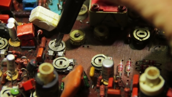 Radio Engineer Configures The Electric Circuit.