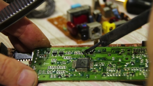 Soldering Electronics On Circuit Board