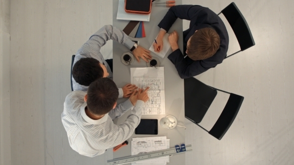 Top View Of Architects Planning a House Project