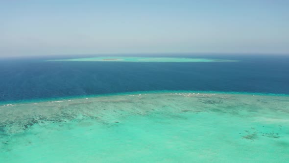 Seascape with Coral Reef and Atoll in the Blue Sea Balabac, Palawan, Philippines.