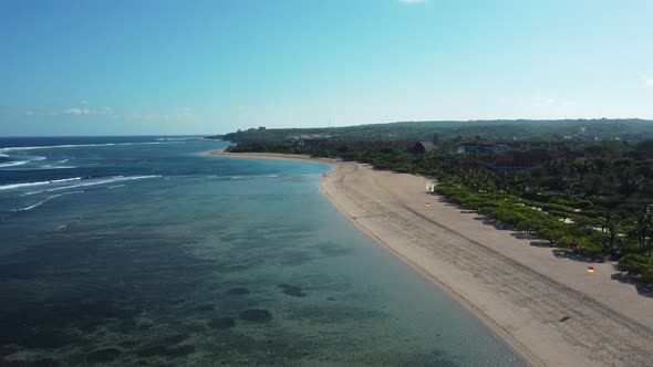 Drone flying around Nusa Dua beach in Bali