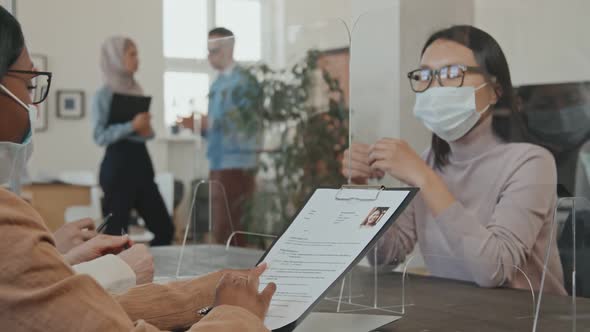 Asian Woman Having Job Interview During Pandemic
