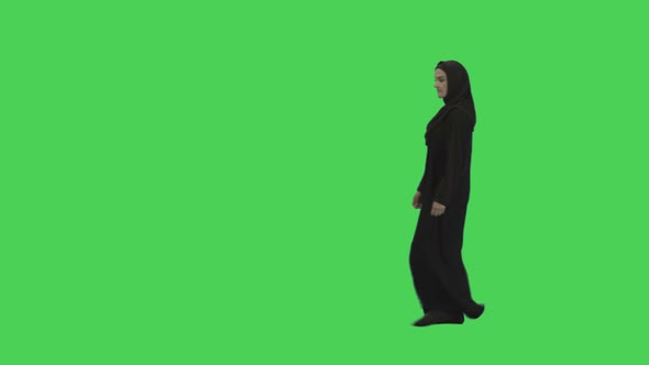 Portrait of Arabic Female walking and looking content to camera