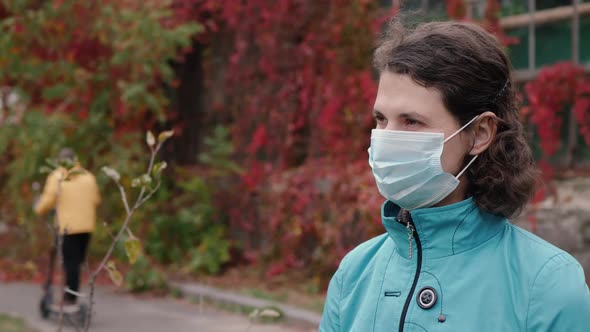 Woman in Protective Mask