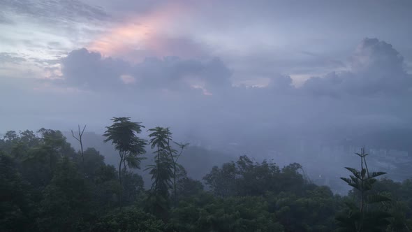 Timelapse Mist  attack the Penang hill at the early morning. 