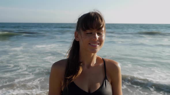 Portrait of an athletic woman at the beach