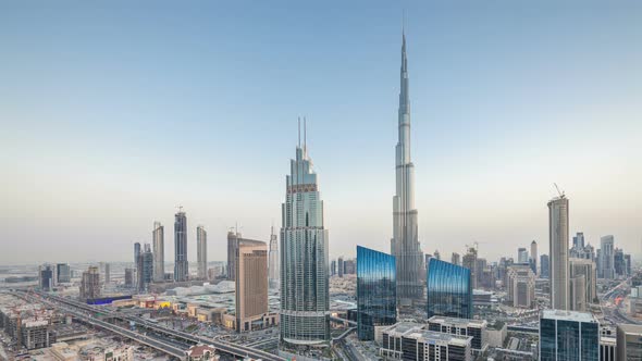 Dubai Downtown Skyline Day to Night Timelapse with Tallest Building and Sheikh Zayed Road Traffic