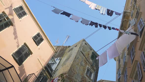 Laundry Hanging In The Narrow Street Of An Old Town