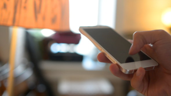 Man Hand Using Smartphone