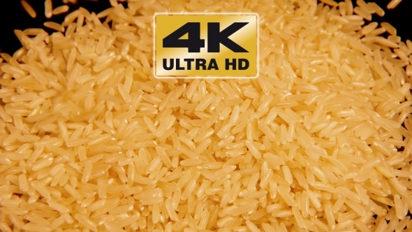 Dry Raw Rice Paddy Grains Pour And Spin Slowly alt