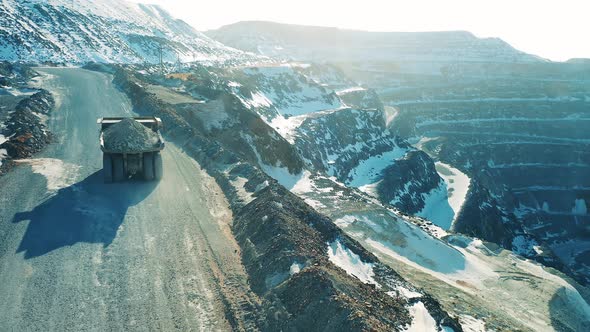 Truck with Copper Ore is Riding Along the Openpit Mine