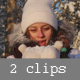 Girl Blows Away the Snow From the Palms in a Sunny Winter Forest - VideoHive Item for Sale