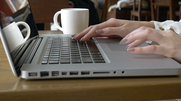 Woman Using Laptop