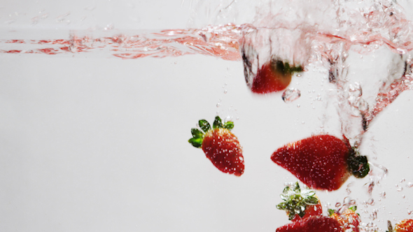 Strawberries Falling into Water 