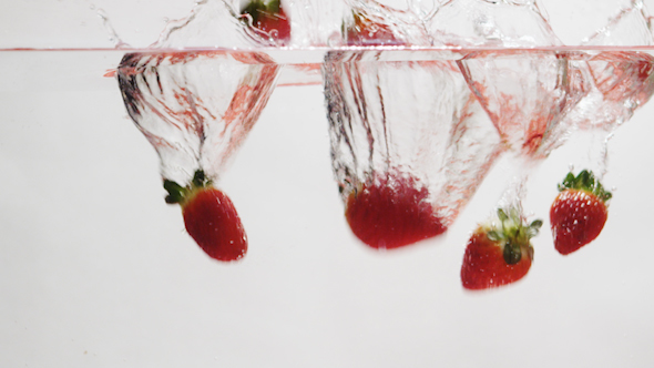 Strawberries Falling into Water