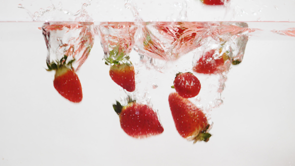 Strawberries Falling into Water