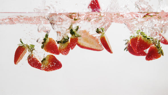 Strawberries Falling into Water