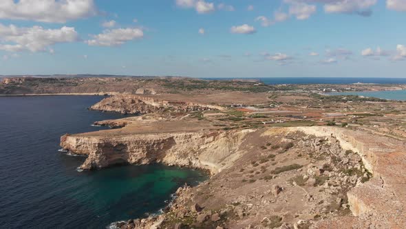 Aerial drone video from northern Malta near the Ghajn Znuber Tower.