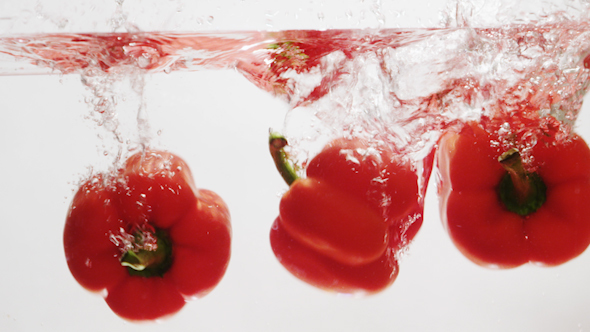 Red Peppers Fall into Water