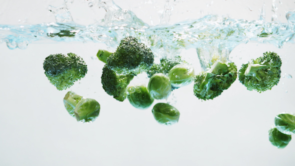 Green Vegetables Falling into Water