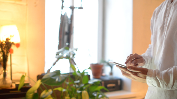 Casual Man Using Smartphone alt