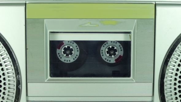 Tape Recorder Playing With Silver Cassette