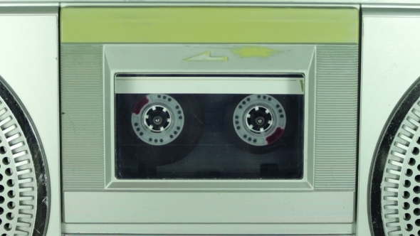 Tape Recorder Playing With Silver Cassette alt
