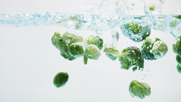 Green Vegetables Falling into Water