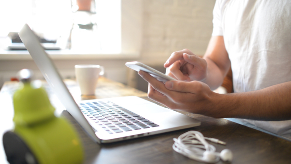 Man Using Smartphone