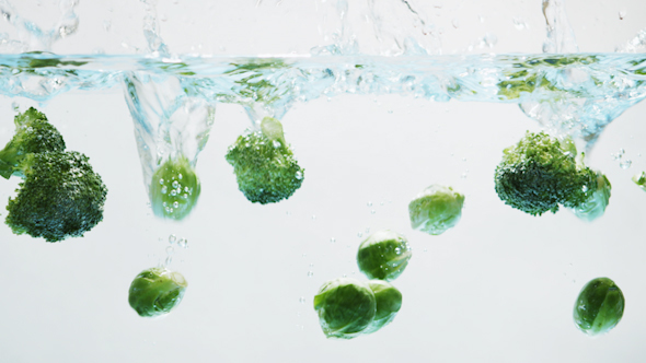 Green Vegetables Falling into Water