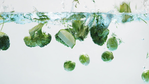 Green Vegetables Falling into Water
