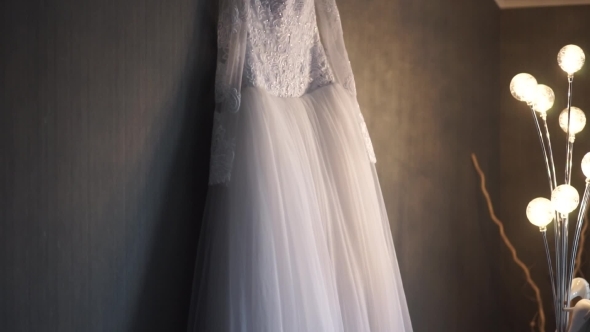 Wedding Dress Hanging On a Hanger