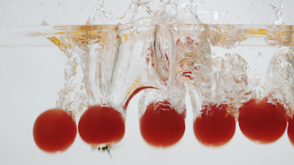 Tomatoes Falling into Water