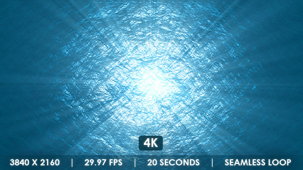 Ocean Waves Reflecting Sun with Rays - 4K alt