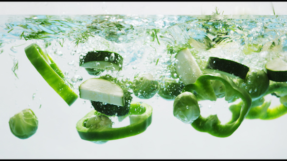 Green Vegetables Falling into Water