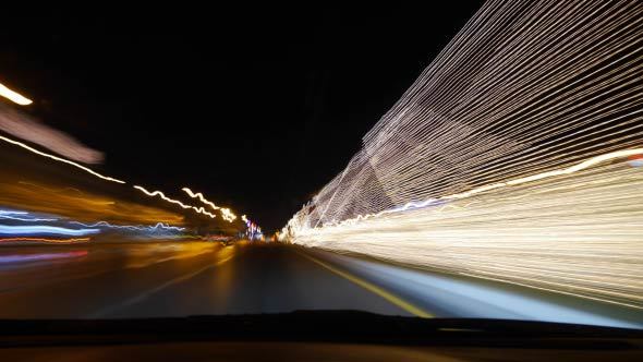 Fast Driving Car At Night