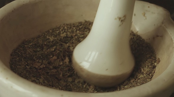 Hands Rubbed The Herbs In a Mortar 3