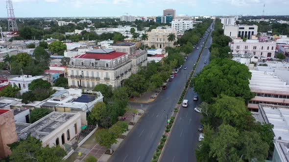 Aerial push in showing the Paseo de Montejo featuring the Palacio Canton archaeology museum and the